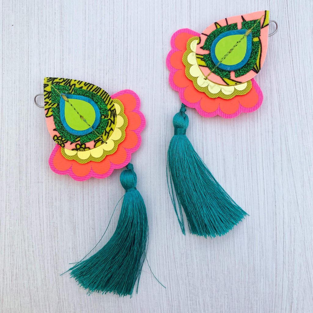 a pair of colourful silky tassel earrings