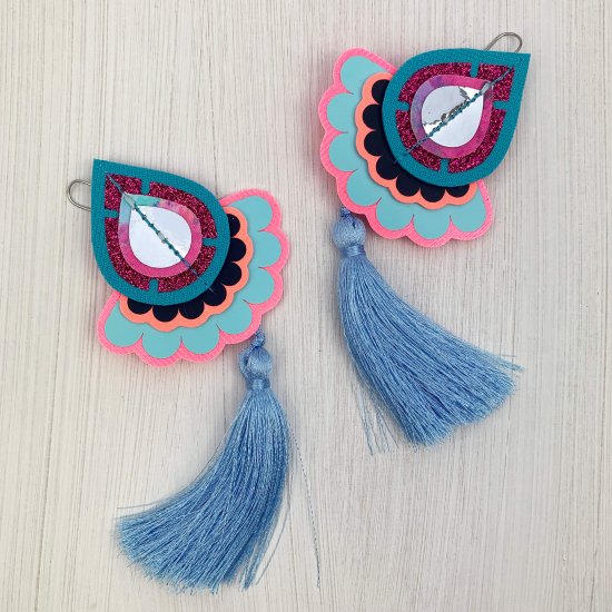 A pair of Statement tassel earrings in pink and blue with silky soft blue tassels